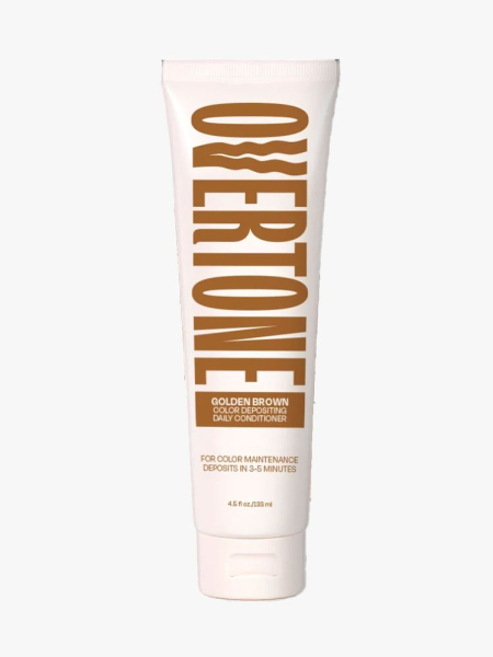 White tube of golden brown Overtone Color-Depositing Daily Conditioner  on light gray background