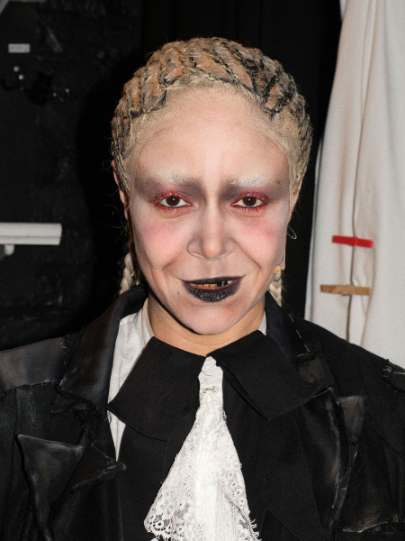 Image may contain Hair Person Clothing Coat Adult Wedding Braid Face and Head